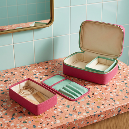 AI concept bathroom-counter arrangement with one tray removed and accessories separated.